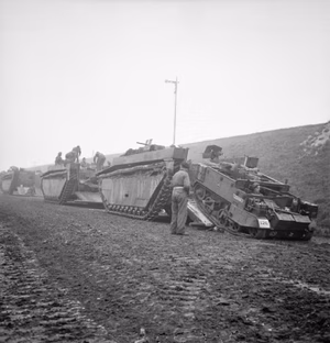 The British Army in North-west Europe 1944-45 A Universal carrier being loaded aboard a Buffalo prior to being transported across the River Ijssel at Arnhem, 13 April 1945.