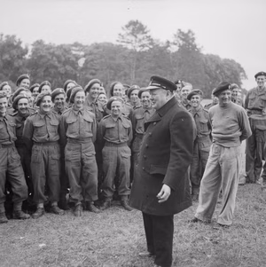 Winston Churchill Visits Normandy, July 1944 Prime Minister Winston Churchill and General Sir Bernard Montgomery gather with troops in Caen on 22 July 1944 who took part in the D-Day landings.