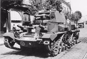 For documentary purposes the German Federal Archive often retained the original image captions , which may be erroneous, biased, obsolete or politically extreme . Englischer Panzer in Calais-Vorstadt. Calais. 27.5.1940, 13 Uhr