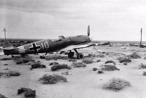 A damaged German Messerschmitt Me 109F from III/JG27 at Fuka, Egypt.
