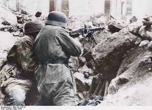 This is a retouched picture , which means that it has been digitally altered from its original version. Modifications: recolored . The original can be viewed here: Bundesarchiv Bild 183-J24116, Italien, Monte Cassino.jpg : . Modifications made by Ruffneck'88 . Italien, Monte Cassino ( ) Photographer Lüthge Title Italien, Monte Cassino Original caption For documentary purposes the German Federal Archive often retained the original image captions , which may be erroneous, biased, obsolete or politically extreme . Scherl Bilderdienst Der Heldenkampf von Cassino. Wenn der Gegner glaubt, mit dem Übergewicht seiner Flugzeuge und schweren Waffen die deutschen Linien in Cassino eindrücken zu können, so hat er nicht mit der kämpferischen Überlegenheit und dem beispiellosen Heldenmut der deutschen Fallschirmjäger gerechnet, die jede Ruine zu einer Festung, jeden Trichter zu einem Widerstandsnest machen, das sie nicht nur verteidigen, sondern aus dem heraus sie immer wieder zu Gegenstössen ansetzen. PK-Kriegsberichter Luethge 1.4.1944 [Herausgabedatum] Depicted place Monte Cassino Date March 1944 date QS:P571,+1944-03-00T00:00:00Z/10 Collection German Federal Archives Native name Das Bundesarchiv Parent institution Federal Government Commissioner for Culture and Media Location Koblenz (headquarters) Coordinates 50° 20′ 32.71″ N, 7° 34′ 21.22″ E Established 1946 Website www.bundesarchiv.de Authority file : Q685753 VIAF : 137346469 ISNI : 0000000405552728 LCCN : n92025526 NLA : 36455393 OSM : 1844909 WorldCat institution QS:P195,Q685753 Current location Allgemeiner Deutscher Nachrichtendienst - Zentralbild (Bild 183) Accession number Bild 183-J24116 Source This image was provided to Wikimedia Commons by the German Federal Archive (Deutsches Bundesarchiv) as part of a cooperation project . The German Federal Archive guarantees an authentic representation only using the originals (negative and/or positive), resp. the digitalization of the originals as provided by the Digital Image Archive .