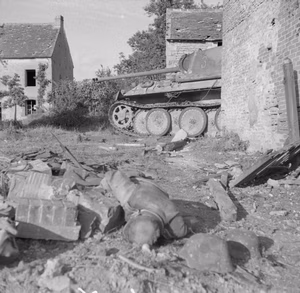 The British Army in Normandy 1944 A knocked-out German Panther tank and a dead infantryman in the Falaise pocket, 25 August 1944.