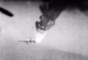 A German aircraft is shot down over Belgium, 17 December 1944. The attacking pilot was Major James Buckingham Dalglish of the 354th Fighter Group, USAAF. Note: The aircraft is described as a Heinkel He 111 bomber. However, it appears to be a much sleeker Messerschmitt Me 410.