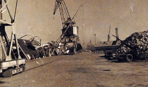 80-G-19923: Damaged ships at Casablanca Harbor, Morocco, during the first days of the U.S. campaign in North Africa. French ship SS Porthos is shown damaged. (4/7/2015).
