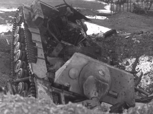 A destroyed German Jagdpanzer IV near Marnach, Luxembourg, in January 1945. The description claims that the tank was destroyed by fighter-bombers of the U.S. XIX Tactical Air Command during the German withdrawal across the Our river to Dasburg, Germany, 22-25 January 1945.