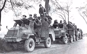 Forces of the Royal Hamilton Light Infantry , part of the 2nd Canadian Infantry Division , move towards South Beveland during the Battle of the Scheldt