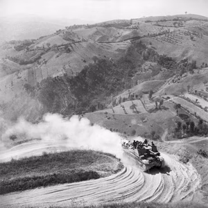 A sexton 25-pounder self-propelled gun negotiates a hairpin bend on a mountain road near Mondaino during the advance through the Gothic Line, Italy, 6 September 1944. A sexton 25-pounder self-propelled gun negotiates a hairpin bend on a mountain road near Mondaino during the advance through the Gothic Line, 6 September 1944. (This is actually a Sexton 25 Pr SP)