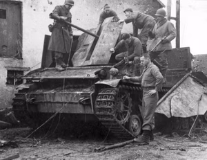 A captured German Flakpanzerkampfwagen IV (3,7cm Flak 43) (Sd.Kfz. 161/3) „Möbelwagen“ at Hosingen, Luxembourg, in February 1945.