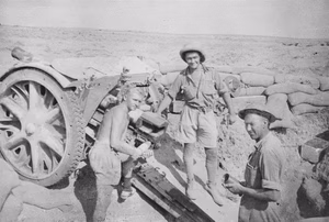 Gunners from the Australian 2/12th Field Regiment manning a captured Italian gun at Tobruk