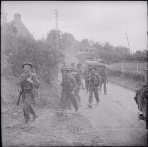 The British Army in the Normandy Campaign 1944 Infantry moving up during attacks between Hill 112 and Hill 113 in the Odon valley, 16 July 1944.