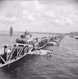 The Polish Army in Normandy 1944 Sherman tank of the 1st Polish Armoured Division commencing its journey to shore along Floating Bridge at Arromanches.