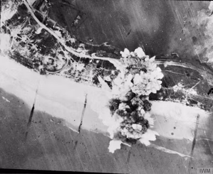 The Polish Air Force in the North-west Europe Campaign, 1944-1945 What the Spitfire dive-bombers could do. Explosions straddle German flak positions close to the shoreline on Walcheren Island, 30 October 1944. This attack, carried out by Spitfire XVIs of one of the squadrons of the No. 131 (Polish) Wing, was part of a sustained 'softening-up' campaign by No. 84 Group and the bomber forces in advance of an amphibious assualt on the fortified island.