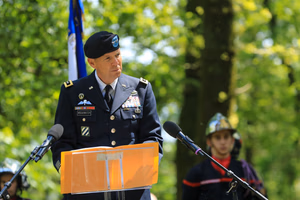 Maj. Gen. Jeffery Broadwater, the V Corps deputy commanding general, delivers featured remarks June 3 in Mortain, France, during a ceremony commemorating the Battle of Mortain held on “Hill 314” – the site of a remarkable defensive stand by 30th Infantry Division Soldiers 79 years ago. For five days, the DCG told an engaged local national crowd, around 700 surrounded Americans fought off assaults by the 17th Panzer Division, despite running dangerously low on ammunition and almost entirely lacking food and supplies. Despite losing 400 men during fierce fighting, the “GIs” held their crucial position until relief arrived, inflicting heavy casualties on the enemy during the process. Their courageous stand helped ensure the continued success of the U.S. breakout from Normandy in June 1944. The DCG joined town and regional officials, the USAF-E Band, support Soldiers, organizers and citizens of the small, picturesque Norman town for a captivating ceremony. Grateful local officials presented the DCG the town medal after the event. (Photo by Sgt. 1st Class Lisa Litchfield, USACAPOC)
