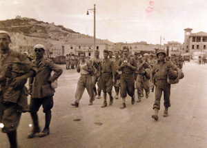 80-G-55362: Italian Prisoners at Licata, Sicily, Italy. Photograph received November 11, 1943. (4/28/2015).