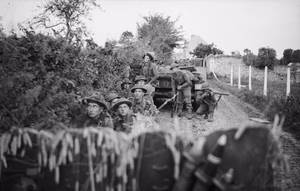 The British Army in the Normandy Campaign 1944 Troops of 130th Brigade, 43rd (Wessex) Division take cover from mortar fire, 10 July 1944.