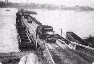 The Rozich Blackburn Tompkins Bridge, a pontoon bridge built by the 51st Combat Engineers across the Rhine, upstream from the Ludendorff Bridge at Remagen, between Kripp and Linz.