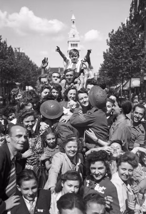 Cheering crowds greet British troops in Paris, 26 August 1944. Cheering crowds greet British troops in Paris, 26 August 1944.