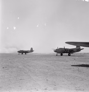 Royal Air Force- Operations in the Middle East and North Africa, 1939-1943. Douglas Boston Mark IIIs of No. 24 Squadron SAAF prepare to take off from Bir el Beheira, Libya, to bomb enemy positions in the 'Knightsbridge' area during the first Battle of Alamein.