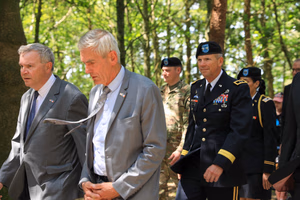 Maj. Gen. Jeffery Broadwater, the V Corps deputy commanding general, surrounded by local and regional officials, marches toward an historic monument June 3 in Mortain, France. The DCG subsequently delivering featured remarks during a ceremony commemorating the Battle of Mortain held on “Hill 314” – the site of a remarkable defensive stand by 30th Infantry Division Soldiers 79 years ago. For five days, the DCG told an engaged local national crowd, around 700 surrounded Americans fought off assaults by the 17th Panzer Division, despite running dangerously low on ammunition and almost entirely lacking food and supplies. Despite losing 400 men during fierce fighting, the “GIs” held their crucial position until relief arrived, inflicting heavy casualties on the enemy during the process. Their courageous stand helped ensure the continued success of the U.S. breakout from Normandy in June 1944. The DCG joined town and regional officials, the USAF-E Band, support Soldiers, organizers and citizens of the small, picturesque Norman town for a captivating ceremony. Grateful local officials presented the DCG the town medal after the event. (Photo by Sgt. 1st Class Lisa Litchfield, USACAPOC)