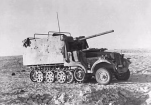 A damaged German SdKfz 6/3 (7,62 cm captured Russian F-22 gun 296(r) mounted on a SdKfz 6 half track) of the 605th Panzerjäger-Abteilung near El Alamein, Egypt, in August 1942.
