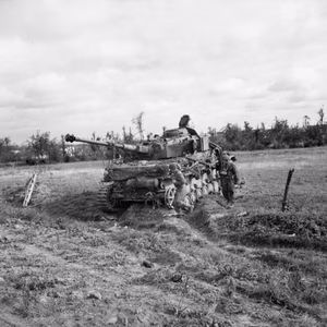 The British Army in Normandy 1944 A knocked-out German PzKpfw IV tank near Caen, 9 July 1944.