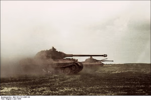 This is a retouched picture , which means that it has been digitally altered from its original version. Modifications: recolored . The original can be viewed here: Bundesarchiv Bild 101I-721-0397-34, Frankreich, Panzer VI (Tiger II, Königstiger).jpg : . Modifications made by Ruffneck'88 . .mw-parser-output table.commons-file-information-table,.mw-parser-output .fileinfotpl-type-information,.mw-parser-output .fileinfotpl-type-artwork{border:1px solid var(--border-color-base,#a2a9b1);background-color:var(--background-color-interactive-subtle,#f8f9fa);padding:5px;font-size:95%;border-spacing:2px;box-sizing:border-box;margin:0;width:100%;color:inherit}.mw-parser-output table.commons-file-information-table>tbody>tr,.mw-parser-output .fileinfotpl-type-information>tbody>tr,.mw-parser-output .fileinfotpl-type-artwork>tbody>tr{vertical-align:top}.mw-parser-output table.commons-file-information-table>tbody>tr>td,.mw-parser-output table.commons-file-information-table>tbody>tr>th,.mw-parser-output .fileinfotpl-type-information>tbody>tr>td,.mw-parser-output .fileinfotpl-type-information>tbody>tr>th,.mw-parser-output .fileinfotpl-type-artwork>tbody>tr>td,.mw-parser-output .fileinfotpl-type-artwork>tbody>tr>th{padding:4px}.mw-parser-output .fileinfo-paramfield{background:#ccf;text-align:right;padding-right:0.4em;width:15%;font-weight:bold;color:inherit}.mw-parser-output .commons-file-information-table+table.commons-file-information-table,.mw-parser-output .commons-file-information-table+div.commons-file-information-table>table{border-top:0;padding-top:0;margin-top:-8px}@media only screen and (max-width:719px){.mw-parser-output table.commons-file-information-table,.mw-parser-output .commons-file-information-table .fileinfotpl-type-information,.mw-parser-output .commons-file-information-table .fileinfotpl-type-artwork{border-spacing:0;padding:0;word-break:break-word;width:100%!important}.mw-parser-output .commons-file-information-table>tbody,.mw-parser-output .fileinfotpl-type-information>tbody,.mw-parser-output .fileinfotpl-type-artwork>tbody{display:block}.mw-parser-output .commons-file-information-table>tbody>tr>td,.mw-parser-output .commons-file-information-table>tbody>tr>th,.mw-parser-output .fileinfotpl-type-information>tbody>tr>td,.mw-parser-output .fileinfotpl-type-information>tbody>tr>th,.mw-parser-output .fileinfotpl-type-artwork>tbody>tr>td,.mw-parser-output .fileinfotpl-type-artwork>tbody>tr>th{padding:0.2em 0.4em;text-align:left;text-align:start}.mw-parser-output .commons-file-information-table>tbody>tr,.mw-parser-output .fileinfotpl-type-information>tbody>tr,.mw-parser-output .fileinfotpl-type-artwork>tbody>tr{display:flex;flex-direction:column}.mw-parser-output .commons-file-information-table+table.commons-file-information-table,.mw-parser-output .commons-file-information-table+div.commons-file-information-table>table{margin-top:-1px}.mw-parser-output table .fileinfo-paramfield{box-sizing:border-box;flex:1 0 100%;width:100%}}.mw-parser-output table.commons-file-information-table,.mw-parser-output .fileinfotpl-type-information,.mw-parser-output .fileinfotpl-type-artwork,.mw-parser-output .fileinfo-paramfield{color:var(--color-base,#202122)}html.skin-theme-clientpref-night .mw-parser-output .fileinfo-paramfield{background:#2a2a5c;color:white}html.skin-theme-clientpref-night .mw-parser-output .fileinfotpl-type-artwork tbody>tr>th[style*="#ccf"]{background-color:#2a2a5c!important;color:white}@media screen and (prefers-color-scheme:dark){html.skin-theme-clientpref-os .mw-parser-output .fileinfo-paramfield{background:#2a2a5c;color:white}html.skin-theme-clientpref-os .mw-parser-output .fileinfotpl-type-artwork tbody>tr>th[style*="#ccf"]{background-color:#2a2a5c!important;color:white}} Frankreich, Panzer VI (Tiger II, Königstiger) ( ) Photographer Wagner Archive description InfoField Description provided by the archive when the original description is incomplete or wrong. You can help by reporting errors and typos at Commons:Bundesarchiv/Error reports . Frankreich.- Panzer VI "Tiger II" (Königstiger) mit Porscheturm bei Fahrt in im ebenen Gelände; KBZ Ob. West Title Frankreich, Panzer VI (Tiger II, Königstiger) Depicted place France Date June 1944 date QS:P571,+1944-06-00T00:00:00Z/10 Collection German Federal Archives Native name Das Bundesarchiv Parent institution Federal Government Commissioner for Culture and Media Location Koblenz (headquarters) Coordinates 50° 20′ 32.71″ N, 7° 34′ 21.22″ E Established 1946 Website www.bundesarchiv.de Authority file : Q685753 VIAF : 137346469 ISNI : 0000000405552728 LCCN : n92025526 NLA : 36455393 OSM : 1844909 WorldCat institution QS:P195,Q685753 Current location Propagandakompanien der Wehrmacht - Heer und Luftwaffe (Bild 101 I) Accession number Bild 101I-721-0397-34 Source This image was provided to Wikimedia Commons by the German Federal Archive (Deutsches Bundesarchiv) as part of a cooperation project . The German Federal Archive guarantees an authentic representation only using the originals (negative and/or positive), resp. the digitalization of the originals as provided by the Digital Image Archive .
