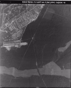 Date: 17 September 1944 Date known Location: Bergen-Belsen; Luneburg; Germany Coordinates (lat, lon): 52.756837, 9.913207 Description: Bergen-Belsen concentration camp on 17 September 1944. A group of prisoners can be seen in the square designated for roll-calls, in which they had to stand for hours, silently and at attention. Often in the burning sun or the rain, snow or frost, prisoners would stand in a square-shaped formation while the SS counted them. UNI: NCAP-000-000-003-440 Sortie: 106G/2946 Frame: 3051 Corporate bodies 541 Squadron (RAF) Image type: Vertical Scale: 8000