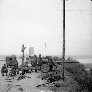 The British Army in North-west Europe 1944-45 17-pdr anti-tank gun of the 21st Anti-Tank Regiment, Guards Armoured Division, guards the approaches to Nijmegen Bridge, 21 September 1944.