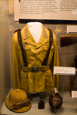 Tropical uniform of a soldier in the Afrika Korps ( Deutsches Afrikakorps, DAK , Africa Corps), the expeditionary force of the Wehrmacht , the armed forces of Nazi Germany, operating in Africa during the North African Campaign of World War II from March 1941 to May 1943. Tunic, pith helmet, goggles, water bottle, etc.on display at the U.S. Army Airborne &amp; Special Operations Museum (ASOM) near Fort Bragg, Fayetteville, North Carolina.