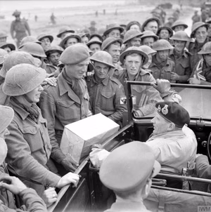 The British Army in Normandy 1944 General Montgomery stops his car to chat to troops during a tour of 1st Corps area near Caen, 11 July 1944.