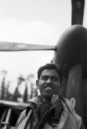 Flight Lieutenant C L F "Jimmy" Talalla of No. 122 Squadron RAF, standing in front of his North American Mustang Mk III at Ellon, Normandy, 6 August 1944. Flight Lieutenant C L F "Jimmy" Talalla of No. 122 Squadron RAF, standing in front of his North American Mustang Mark III at B12/ Ellon, Normandy. Born of Singhalese parents in Kuala Lumpur, Malaya, Talalla joined the RAF in 1941 and served as a sergeant pilot with No. 118 Squadron RAF, flying Supermarine Spitfires, before being commissioned in 1942. He joined 122 Squadron as a flight commander in 1944 and finished the war having shot down 5 enemy aircraft. His brother, Warrant Officer H C B Talalla, a Hawker Typhoon pilot serving with No. 182 Squadron RAF, was killed in action, over the Falaise area on 25 July 1944.