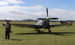 Two seat dual controlled Spitfire T.IX Rolls Royce Merlin 25, 1800hp. Colour Scheme: 485 Squadron RAF Built at Castle Bromwich as a single seat low level LF Mark IX fighter, The Grace Spitfire served in the front line of battle throughout the last twelve months of WWII. ML407 is currently in the colour scheme as she was when delivered on 29 April 1944 by a famous lady A.T.A. pilot, Jackie Moggridge, to 485 New Zealand Squadron at ALG Selsey to Flying Officer Johnnie Houlton DFC, with Squadron letters OU and Johnnie’s personal insignia letter V (for Vicki his wife to be). In 2014 the Grace Spitfire celebrated the 70th Anniversary on 29 April 1944, of D-Day when on 6 June 1944 Johnnie Houlton flying his Spitfire OU-V was accredited with shooting down the first enemy aircraft (Junkers 88) over the Normandy beach head just south of Omaha Beach. ML407 did a total of 176 operational sorties, predominantly ground attack, amassing over 320 combat hours whilst in the 2nd Tactical Air Force (TAF) going from 485 New Zealand Squadron in December 1944 to 341 Free French, 308 Polish, 349 Belgian, 345 Free French, 332 Norwegian Squadrons, returning to 485 New Zealand Squadron at the end of the War. Miraculously, ML407 did not suffer any major structural damage during this time. In 1951 Vickers Armstrong at Southampton was commissioned by the Irish Air Corps to convert 20 Spitfires to the trainer configuration. ML407 was one of these, serving with the Irish Army Air Corps as IAC162 until 1960 with a total time of 763 hours flown for the IAC. In 1968 ML407 was sold on, finally ending up in Scotland, and went into storage. <a href=" http://ultimatewarbirdflights.com/flights/supermarine-spitfire-t-ix-ml407/ " rel="nofollow">ultimatewarbirdflights.com/flights/supermarine-spitfire-t...</a>