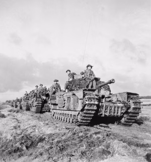 Churchill tanks of 3rd Scots Guards, 6th Guards Tank Brigade, with infantry of 2nd Argyll and Sutherland Highlanders, advance near Beringe in Holland, 22 November 1944. Churchill tanks of 3rd Scots Guards, 6th Guards Tank Brigade, with infantry of 2nd Argyll and Sutherland Highlanders, advance near Beringe in Holland, 22 November 1944.