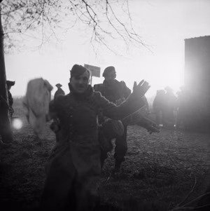 A German POW captured during the Allied assault on Walcheren Island in Holland, November 1944. British assault troops landed on Walcheren at dawn on 1st November 1944 and most of Flushing was included in the first bridgehead. The landings were supported by fire from British warships. The object of the assault is to silence the enemy guns menacing the Scheldt passage to the port of Antwerp. This particular image shows some of the first prisoners captured after the landing.