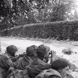 The British Airborne Division at Arnhem and Oosterbeek in Holland Men from Nos. 15 &amp; 16 Platoons, 'C' Company, 1st Battalion Border Regiment, waiting in roadside ditches along the Van Lennepweg to repulse an attack by the enemy, who were barely a hundred yards away, Oosterbeek, 21 September.
