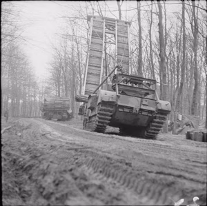 The British Army in North-west Europe 1944-45 Churchill bridgelayer and fascine carrier in the Reichswald forest, 12 February 1945.