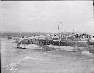 The Royal Navy during the Second World War- Operation Overlord (the Normandy Landings)- D-day 6 June 1944 Landing Craft Infantry (LCI 135, LCI 270 and LCI 262) about to disembark troops of the 9th Canadian Infantry Brigade onto 'Nan White' Beach, JUNO Area, at Bernieres-sur-Mer on D Day.