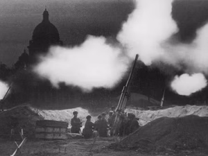 The fire of anti-aircraft guns deployed in the neighborhood of St. Isaac's cathedral during the defense of Leningrad (now called St. Petersburg, its pre-Soviet name) in 1941.