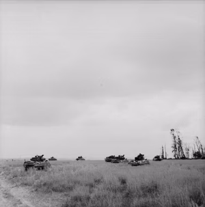 The British Army in Normandy 1944 Sherman tanks advance in the Odon valley near Evrecy, 16 July 1944.