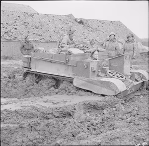 The British Army in North-west Europe 1944-45 A universal carrier of 51st Highland Division ploughing through thick mud during the Reichswald battle, 9 February 1945.
