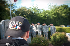 "In a few hours I'm going to take the best company of men in the world into France. We'll give the bastards hell. Strangely, I'm not particularly scared. But in my heart is a terrific longing to hold you in my arms. I love you Sweetheart - forever. Your Tom," an excerpt from a letter that was written by 1st Lt. Thomas Meehan III, company commander of E Company, 506th Parachute Infantry Regiment, 101st Air Assault. The hands of a wristwatch forever stopped at 1:12 on the morning of June 5, 1944 were lost to the fields outside of Beuzeville Au Plain, 56 years later they were recovered. A year later, in 2001, a monument was unveiled to memorialize the crew and paratroopers; closing a chapter of an unfinished story for the family, friends, loved ones and comrades of the men who lost their lives during Operation Overload. The C-47 carrying Meehan was hit with anti-aircraft fire, and caught fire near the rear of the plane. As the fire traveled forward to the cockpit, the paratroopers aboard were unable to jump because the plane's altitude was too low for the parachutes to open. All were lost in the crash. Today, June 3, 2015, Soldiers of the 101st Airborne Division (Air Assault) attend a ceremony to remember those men and their actions on that fateful day. Over 380 service members from Europe and affiliated D-Day historical units are participating in the 71st anniversary as part of JTF D-Day 71. The Task Force, based in Saint Mere Eglise, France, is supporting local events across Normandy, June 2-8, 2015, to commemorate the selfless actions by all the allies on D-Day that continue to resonate 71 years later. (U.S. Army photo by Capt. Saska Ball, USACAPOC(A) PAO) Unit: U.S. Army Civil Affairs and Psychological Operations Command (Airborne) DVIDS Tags: Marine; Soldier; 82nd Airborne Division; AFN; USAFE; 82nd; France; NAVEUR; Honor; USACAPOC; 4th Infantry Division; Band of Brothers; Normandy; Rangers; re-enactment; Sacrifice; SOCEUR; Jumpmaster; 101st; Sky Soldiers; 75th Ranger Regiment; U.S. Army Europe; Armed Forces Network; 1st ID; 82nd Airborne; Public Affairs; 25th; WWII; EUCOM; Jump Wings; Community Relations; Combat Camera; World War II; Infantry; U.S. Marines; paratrooper; Airborne; All American; Amphibious assault; 1st Infantry Division; 21st Theater Sustainment Command; U.S. Air Forces in Europe; Omaha Beach; 4th ID; 29th Infantry Division; 173rd; Utah Beach; Screaming Eagles; D-Day; Iron Mike; Greatest Generation; 101st Air Assault; European Command; 982nd COMCAM; Airborne Operation; U.S. Army Soldier; St. Mere Eglise; AFN-E; Operation Overlord; La Cambe; Re-enactors; American Cemetery; C47; Carentan; Cherbourg; Dutch Marines; 29th ID; Special Operations Command Europe; 4/25th; Foreign Wings; Task Force Normandy; 173rd Infantry Brigade; Community Engagement; U.S. Army Civil Affairs & Psychological Operations Command (Airborne); U.S. Army Europe Band; 1-507th PIR; NATO Alliance; Higgins Boat; Normandy American Cemetery and Memorial; Task Force Normandy 71; Joint Task Force D-Day 71; D-Day 71; Point Du Hoc; 101st (AASLT); La Fierre; USEREUR; 6 June 1944; Juno Beach; Foreign Jump; Dutch Sailors; 409th Combat Service Support Brigade; Naval Forces in Europe; 4/25th Infantry Brigade Combat Team (Airborne) 4/25; 1/75 Rangers; 1-507th Parachute Infantry Regiment; dday71