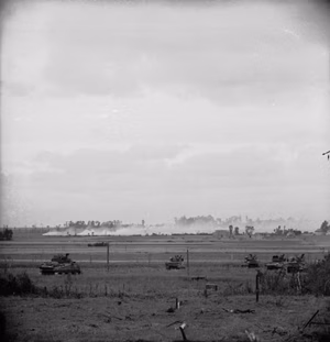 The British Army in Normandy 1944 Sherman tanks advance towards Epron, north of Caen, during Operation 'Charnwood', 9 July 1944.