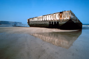 Spud-pier-pontoon of Mulberry Harbour B , in the background Cap Manvieux; Arromanches, Normandy, France