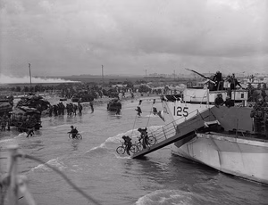 Title / Titre : Personnel of the 9th Canadian Infantry Brigade landing on “Nan White” beach on D-Day / Débarquement de membres de la 9e Brigade d’infanterie canadienne dans le secteur « Nan White » le Jour J [LCI(L) 125th of the 3rd Canadian (264th RN) Flotilla - 125e de la 3e Flotille canadienne (264e MR)] Creator(s) / Créateur(s) : Gilbert Alexander Milne Date(s) : June 6, 1944 / 6 juin 1944 Reference No. / Numéro de référence : MIKAN 3191670. 3623237 <a href=" http://collectionscanada.gc.ca/ourl/res.php?url_ver=Z39.88-2004&amp;url_tim=2012-04-19T14:20:39Z&amp;url_ctx_fmt=info:ofi/fmt:kev:mtx:ctx&amp;rft_dat=3623237&amp;rfr_id=info:sid/collectionscanada.gc.ca:pam&amp;lang=eng " rel="nofollow">collectionscanada.gc.ca/ourl/res.php?url_ver=Z39.88-2004&amp;...</a> <a href=" http://collectionscanada.gc.ca/ourl/res.php?url_ver=Z39.88-2004&amp;url_tim=2012-04-19T14:20:50Z&amp;url_ctx_fmt=info:ofi/fmt:kev:mtx:ctx&amp;rft_dat=3191670&amp;rfr_id=info:sid/collectionscanada.gc.ca:pam&amp;lang=eng " rel="nofollow">collectionscanada.gc.ca/ourl/res.php?url_ver=Z39.88-2004&amp;...</a> Location / Lieu : Bernières-sur-Mer, France Credit / Mention de source : Gilbert Alexander Milne. Canada. Department of National Defence. Library and Archives Canada, PA-137012 / Gilbert Alexander Milne. Canada. Ministère de la défense nationale. Bibliothèque et Archives Canada, PA-137012