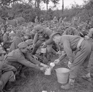 The British Army in Normandy 1944 Tea is served to German prisoners in the Falaise pocket, 22 August 1944.
