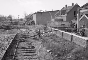 Allied bomb damage to railway sidings at Middleburg station in Holland, November 1944. A scene at the bombed railway sidings of Middleburg station where railway lines were blown over adjoining buildings.