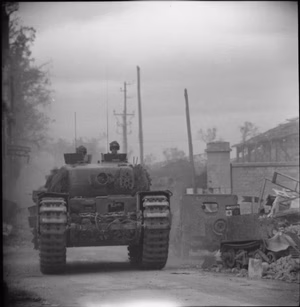 The British Army in the Normandy Campaign 1944 Churchill AVRE of 79th Armoured Division moving into Caen, 10 July 1944.