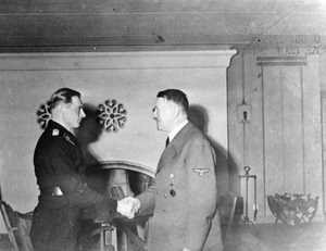 Hitler's headquarter Wolfsschanze near Rastenburg (Ketrzyn) in East Prussia on the 30-th of january 1944. Adolf Hitler rewards Michael Wittmann with Oak Leaves to Knight's Cross .