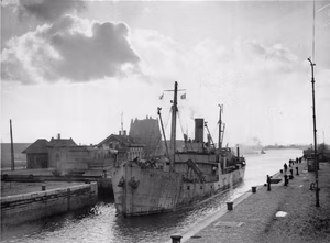 How the Royal Navy Cleared the Scheldt To Antwerp. 20 To 30 November 1944, Antwerp. the Royal Navy Sweeping the Scheldt Channel Clear of Mines To Allow Access To Antwerp. The first coaster entering Antwerp Docks.
