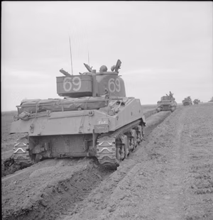 The British Army in the Normandy Campaign 1944 Sherman tanks of 33rd Armoured Brigade during Operation 'Charnwood', the attack on Caen, 8 July 1944.